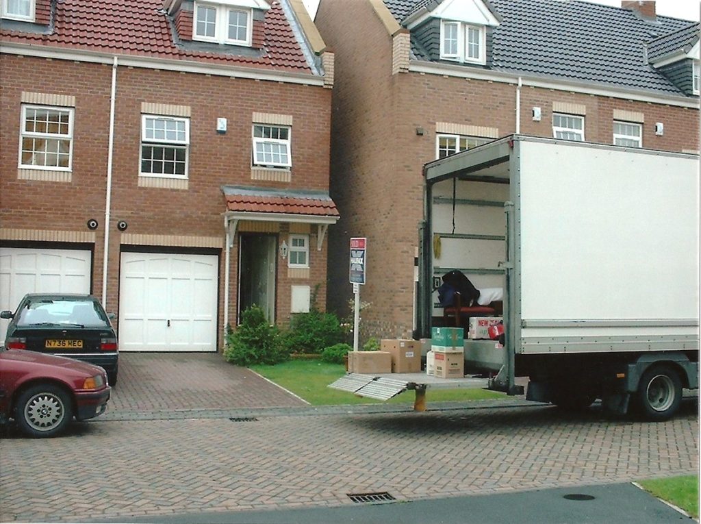 removal van outside a house